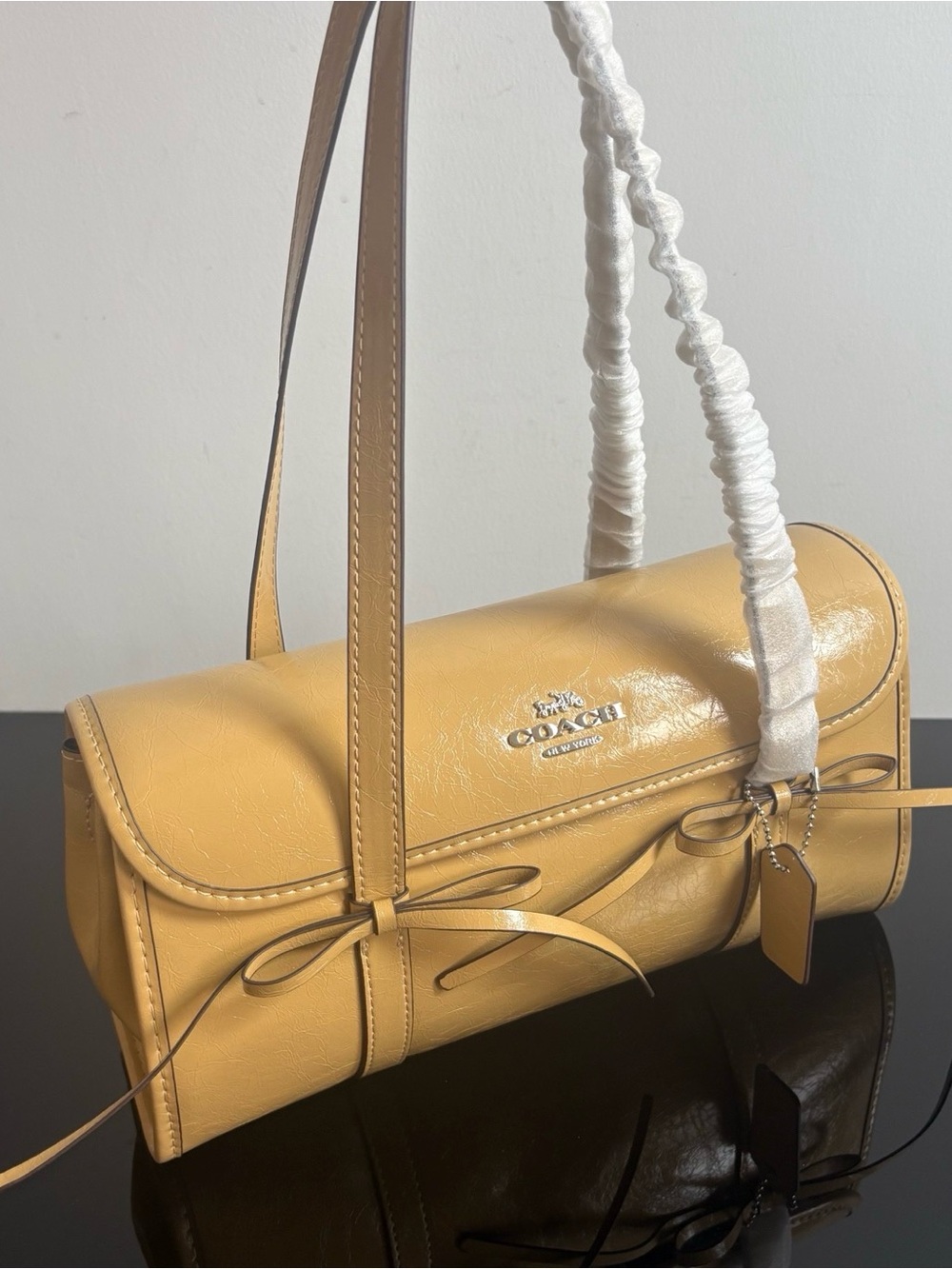 Coach Mustard Pebbled Leather Barrel Bag with Bow Accents - Picture 2 of 9